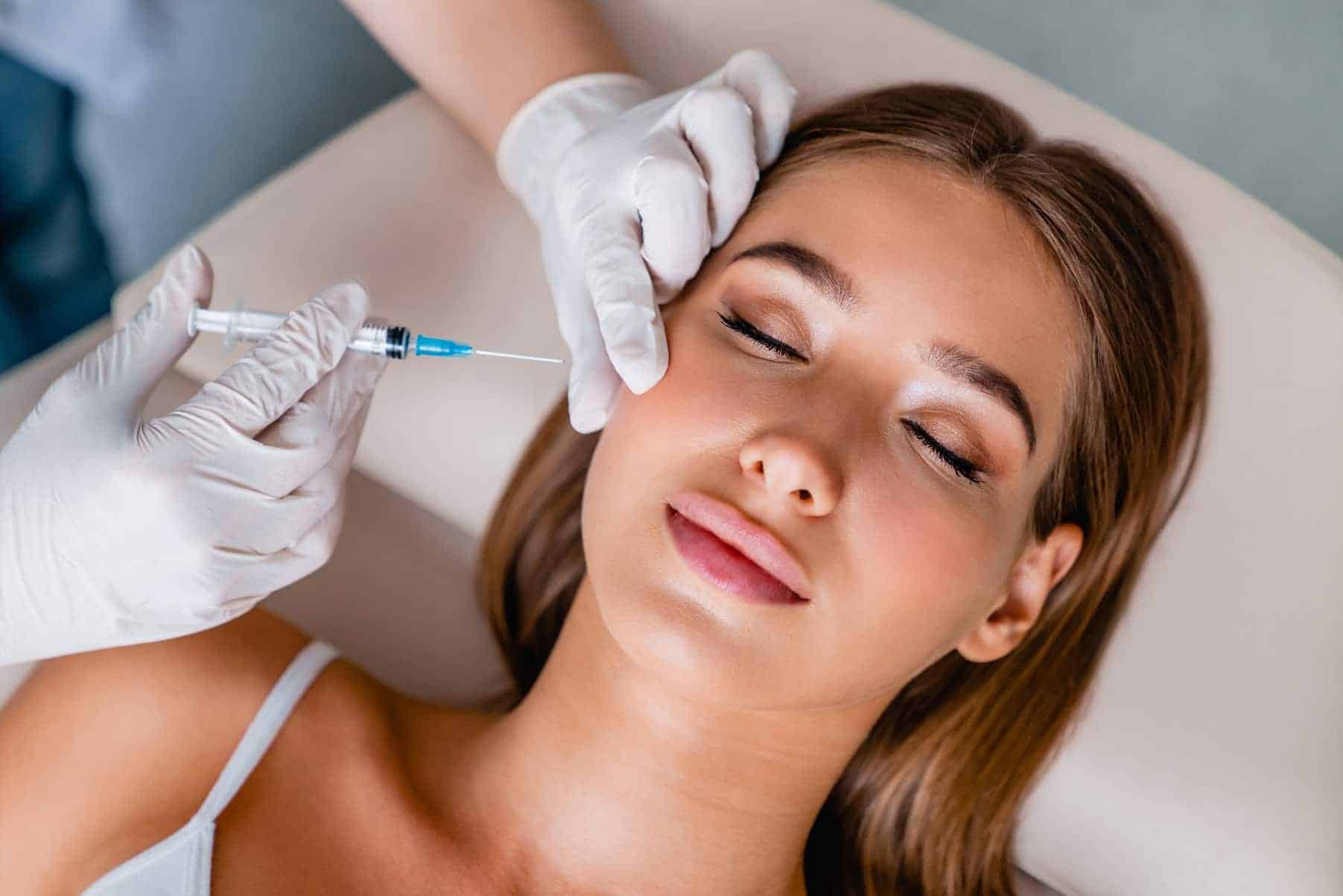 a woman receiving an injection