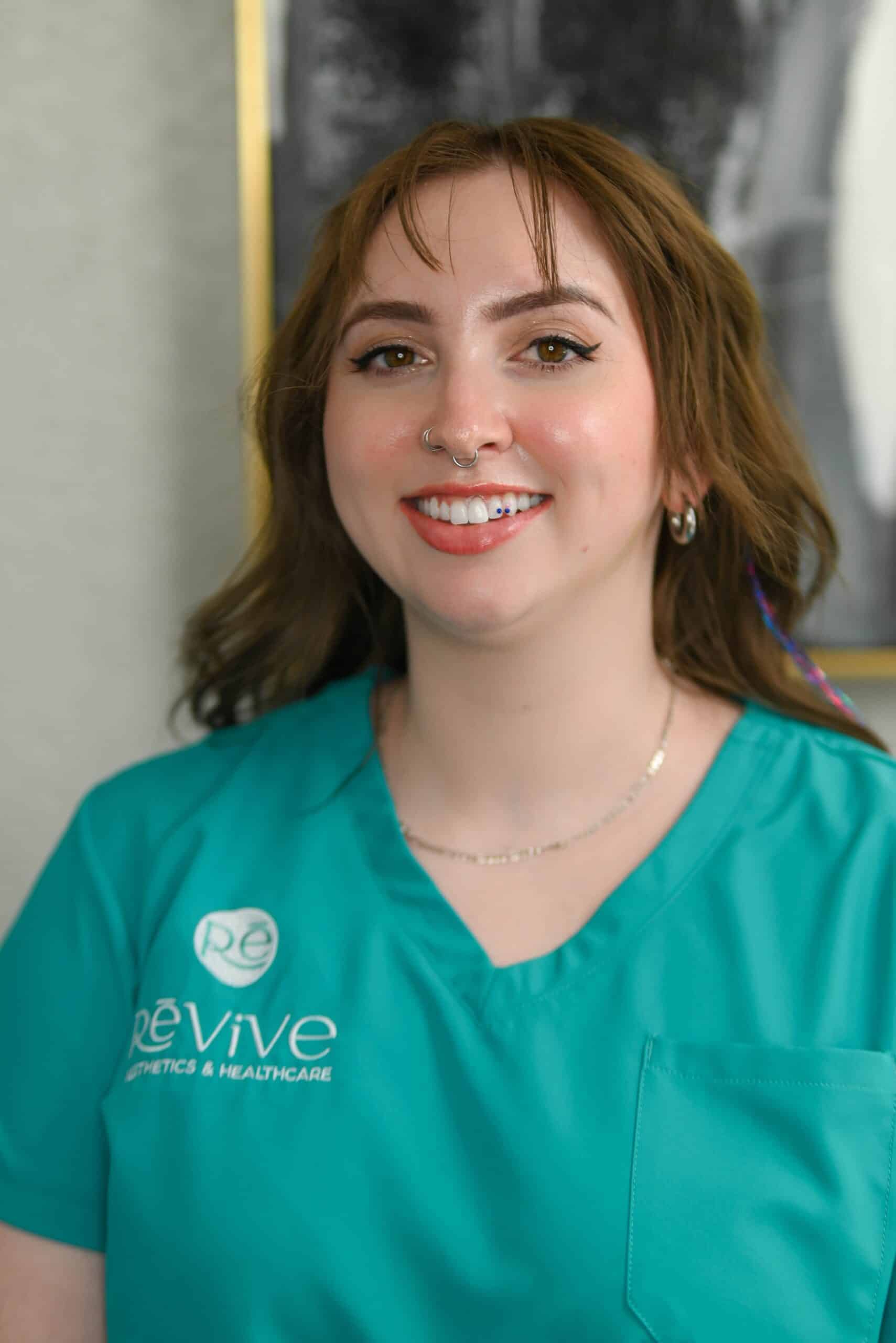 a woman wearing a green scrubs