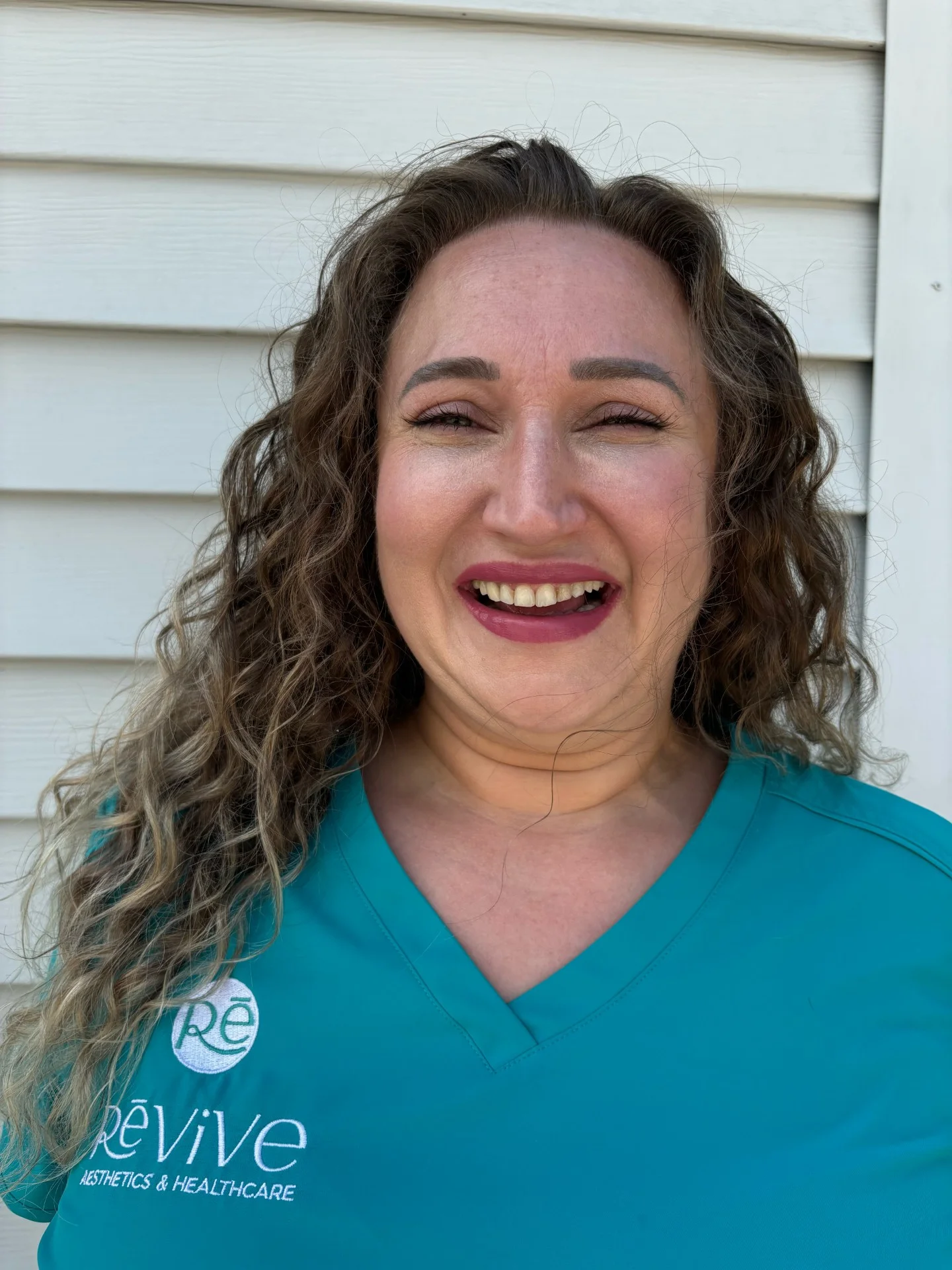 a woman in a blue shirt