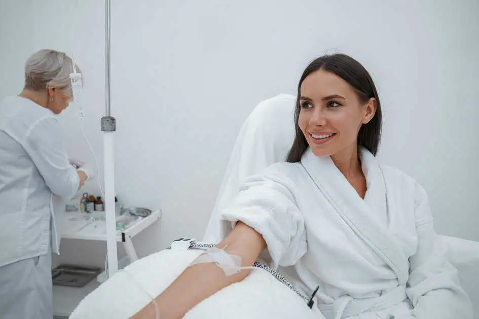 a woman in a hospital bed