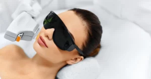 Woman receiving IPL Photofacial treatment at a clinic in Rockwall, TX