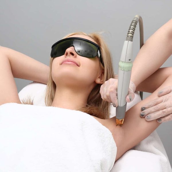 a woman getting laser hair removal