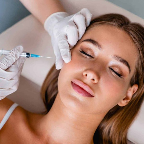 a woman receiving an injection